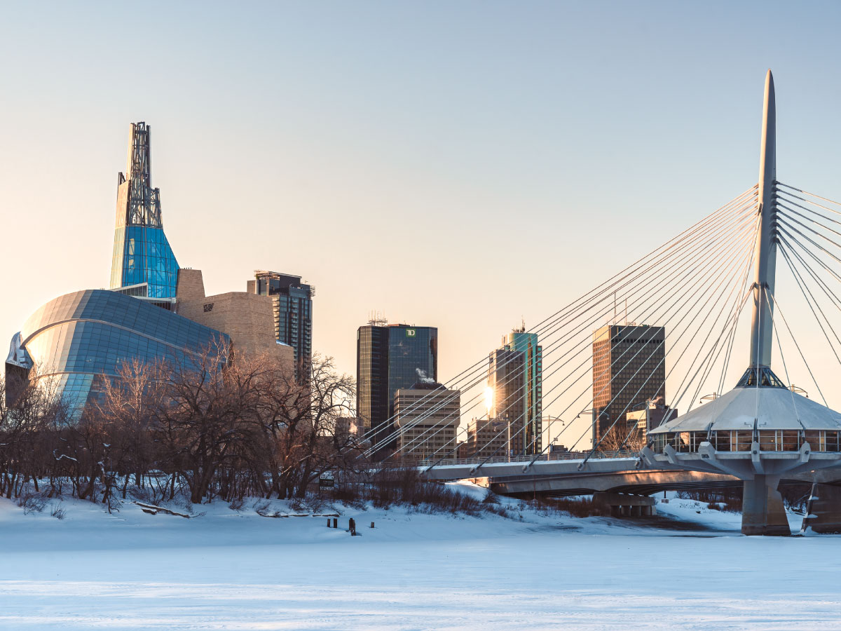 Life in the heart of Winnipeg: A guide to downtown living - River view of downtown Winnipeg from Tache Public Dock | Photo by Non Stop Destination